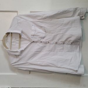 Cache White with blue stiching and pearl snap closure